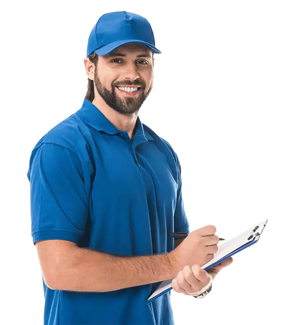 A man in a blue polo shirt and cap holds a clipboard and pen, smiling at the camera—ready to assist with your AC repair or maintenance needs.